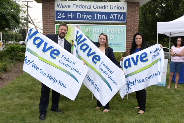 Wave CEOs with Wave branded towels to dry off from the soaking